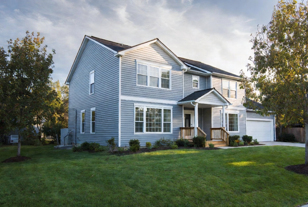 Architectural illustration of a two-story home with blue-gray siding and white trim.